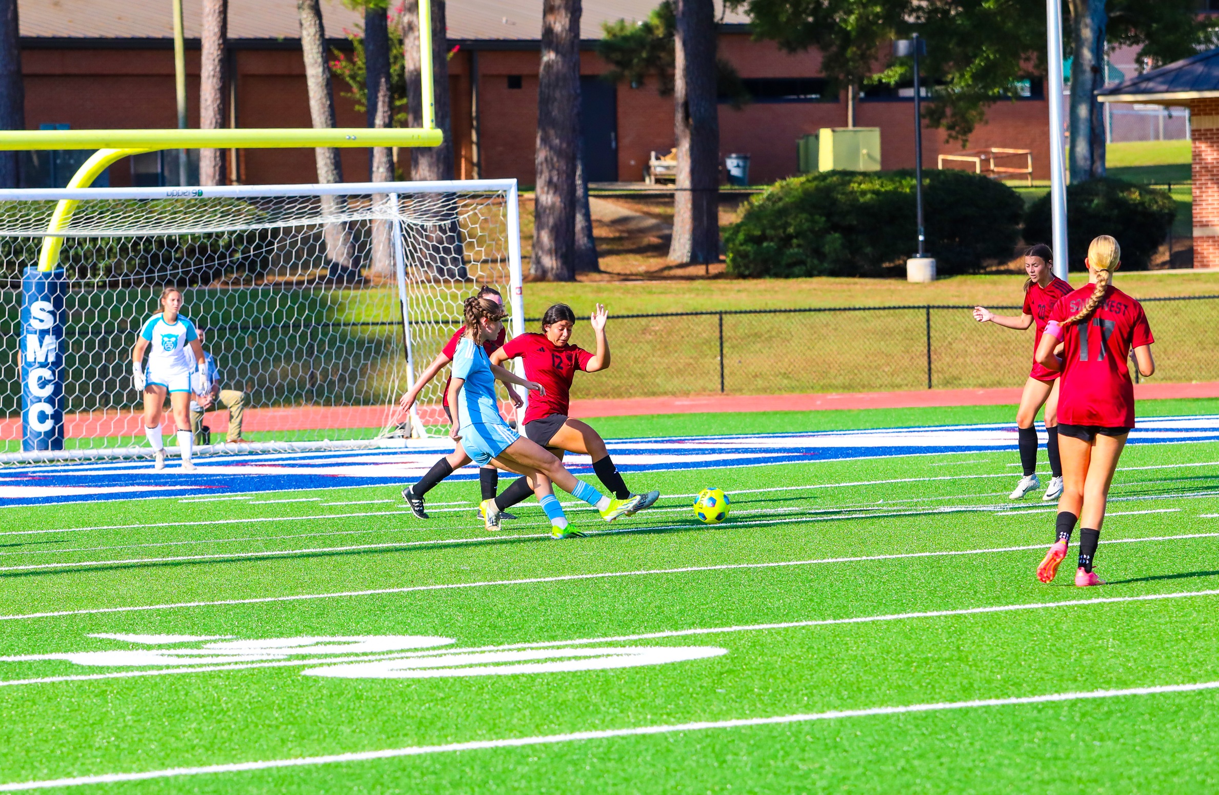 Lady Wolves Drop Season Opener